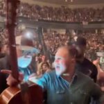 zach bryan lifting guitar