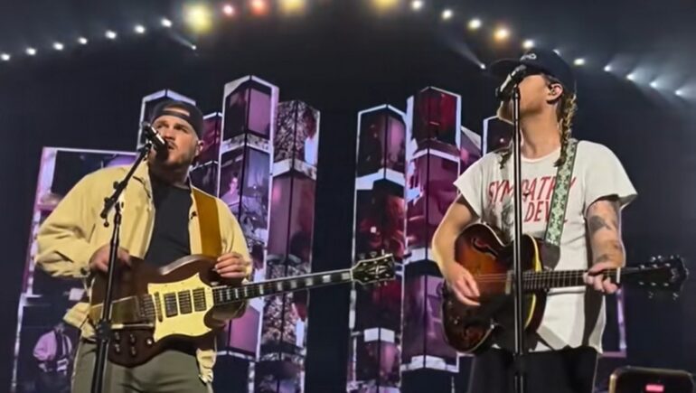 Zach Bryan and lumineers on stage
